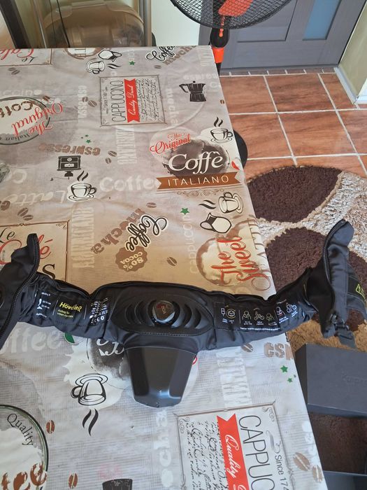 Hövding 3 airbag pentru cicliști și  trotinete electrice stare nouă