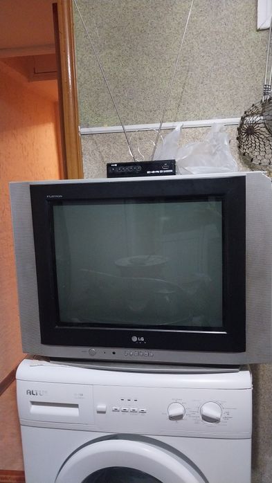 Телевизор LG Отауымен