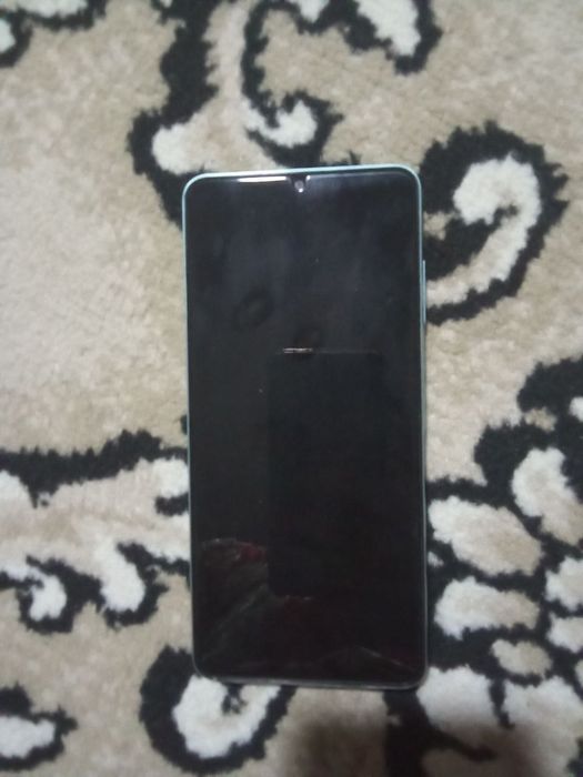 Samsung a 06 1 yil kafolati bilan