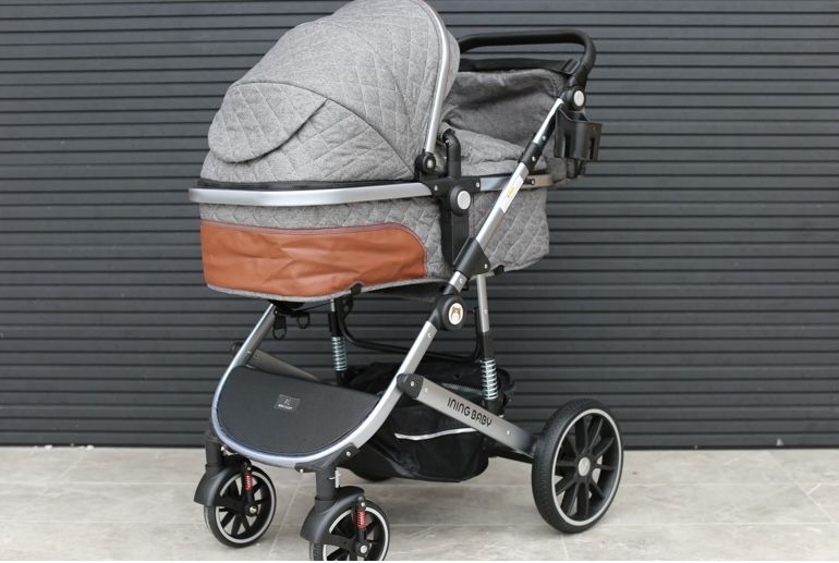 Продам универсальную 2 в 1 коляску «Ining baby”