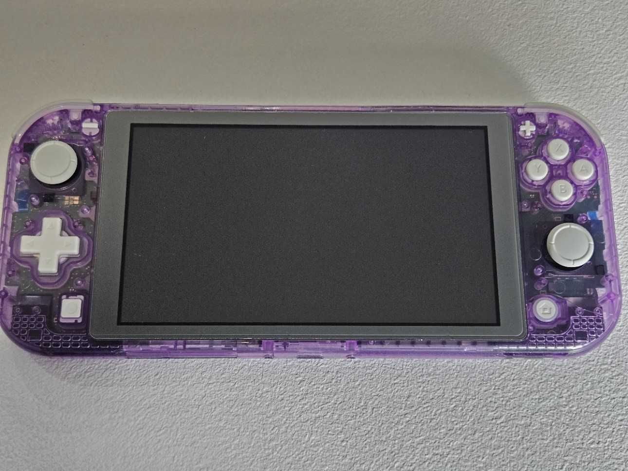 Vand Nintendo Switch lite Atomic Purple modat cu cip