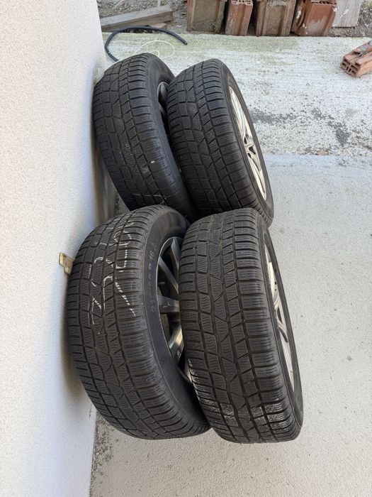Anvelope de iarna  215 60 16,jante din aliaj originale VW Passat