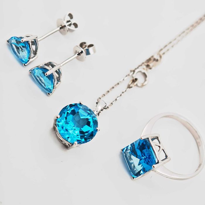 Set aur 18k cu topaz