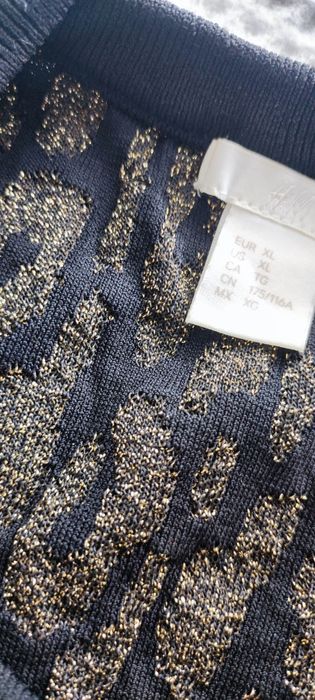 Vând rochie stil casual animal print