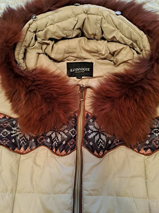 Продаётся пуховик размер.44-48