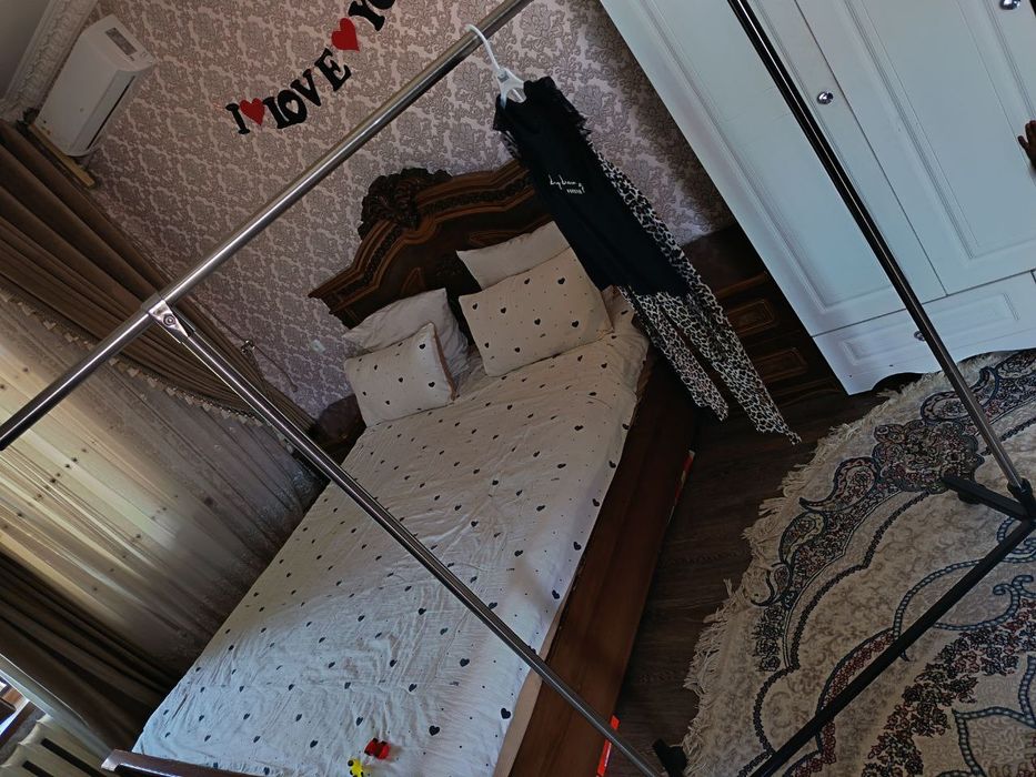 Bolalar va kattalar kiymini ilish uchun sushilka