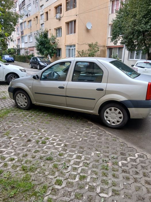 Ford focus 2 sau Dacia Logan