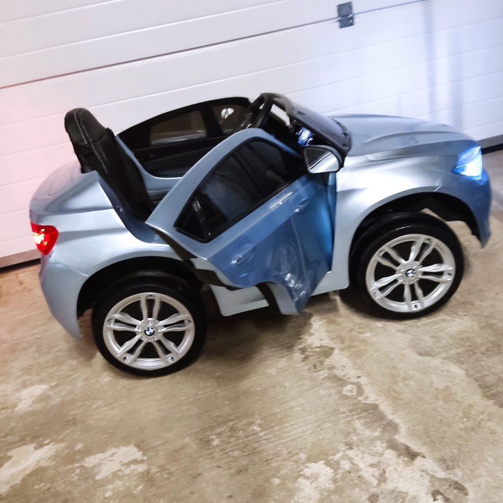 Mașinuța x6 BMWelectrica  electric 12v cu telecomanda nou