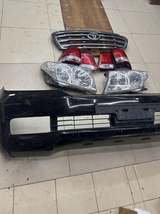 Фары решотка бампера крузак 200