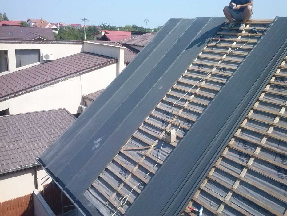 Montaj tigla metalica, reparatii acoperisuri, sisteme pluviale