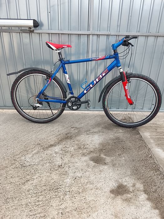 Vând bicicleta cube, roti 26