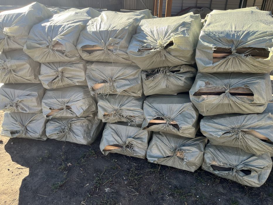 Продам сухие дрова в мешках (доски)