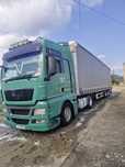 Ansamblu Man tgx semiremorca Schmitz