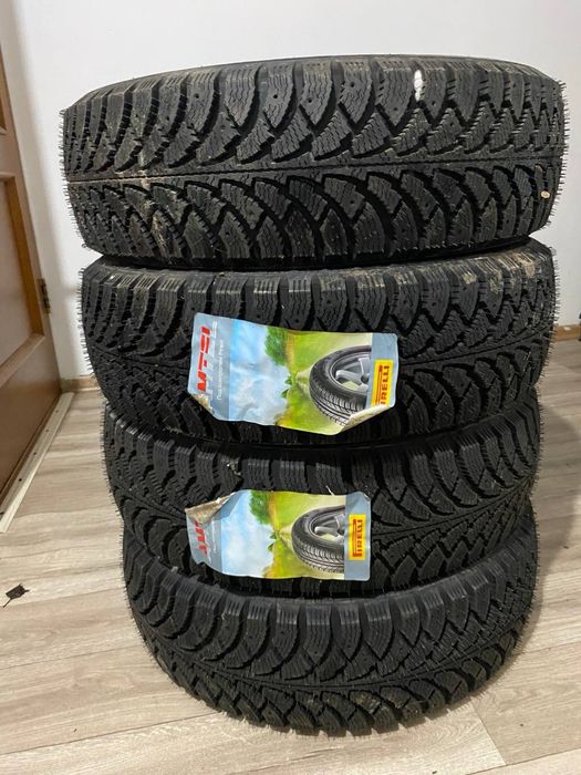 Продам новые комплект зимние шины !