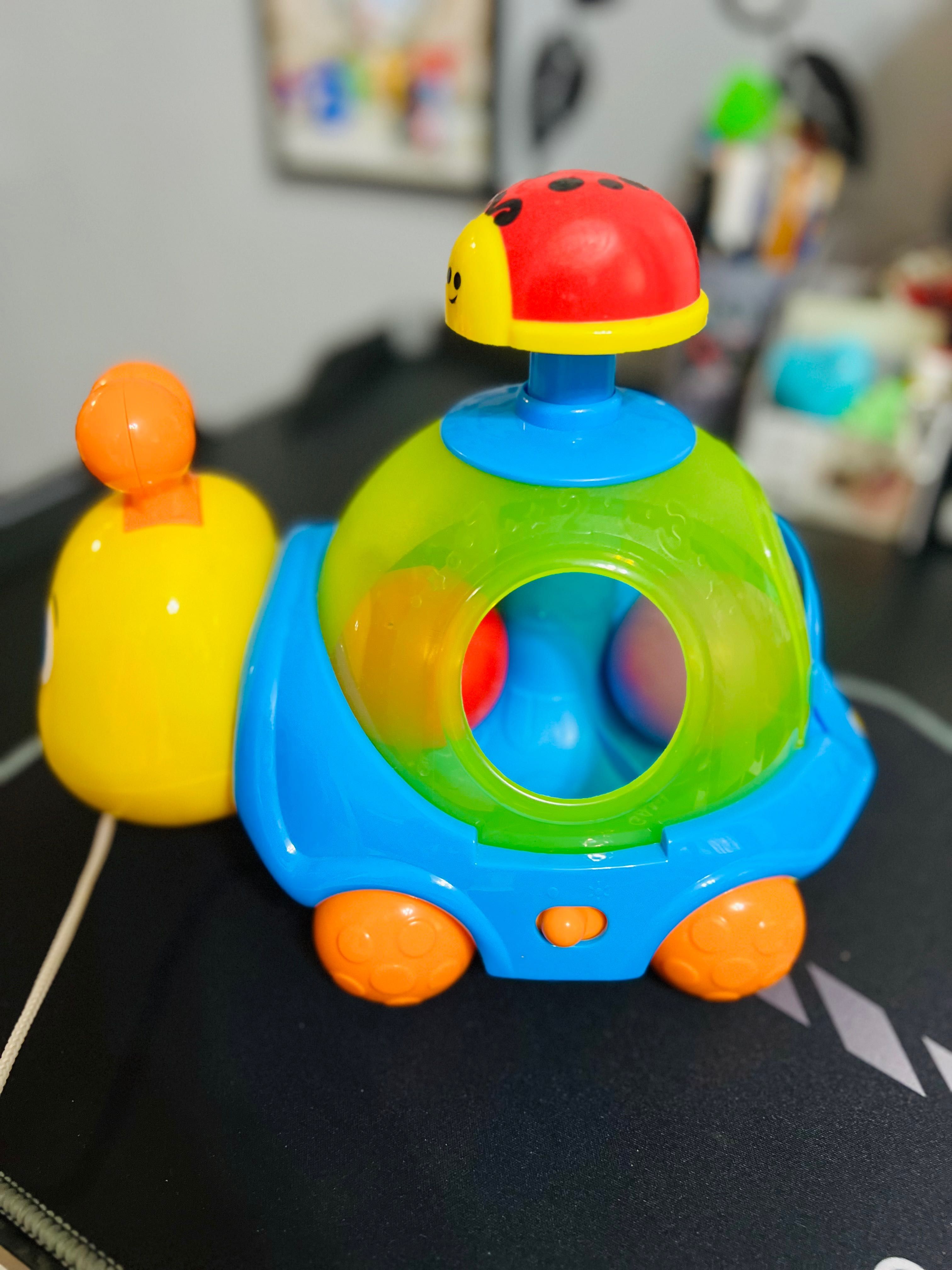 Музикална играчка с топки и въже за дърпане - WinFun охлювче, пумпал