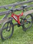 Bicicleta aproape noua