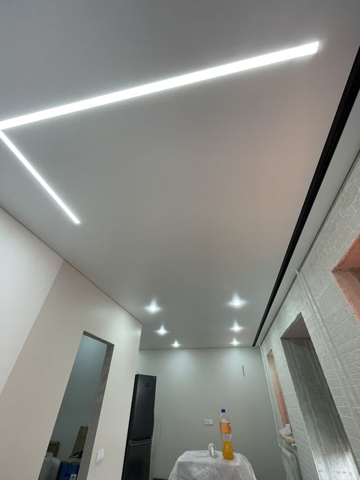 Натяжные потолки  .