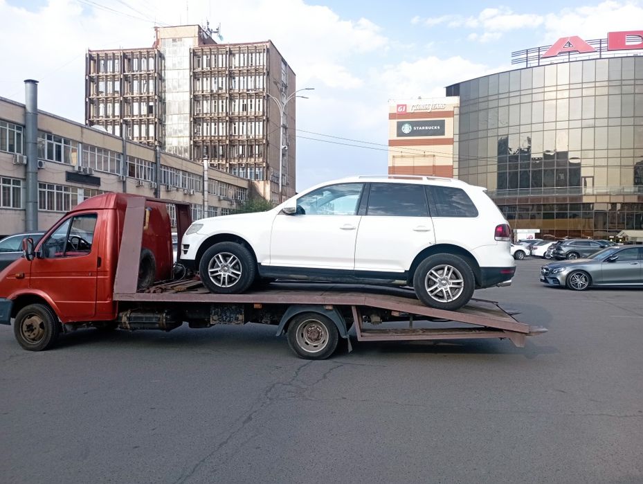 Эвакуатор круглосуточно 24/7 по городу Алматы и по области