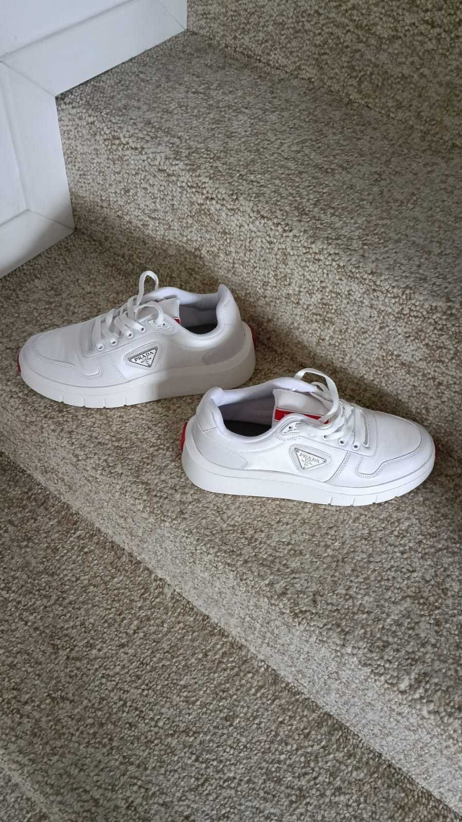 prada  transport inclus