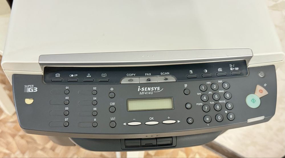 МФУ Canon i-SENSYS MF4140 , лазерный Ч/Б + Факс