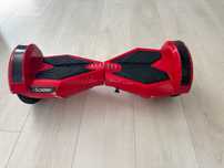 Hoverboard roșu în perfectă stare de functionare