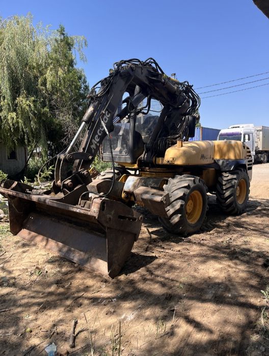Excavator pe roti de 7.7 tone,Mecalac,posibil variante