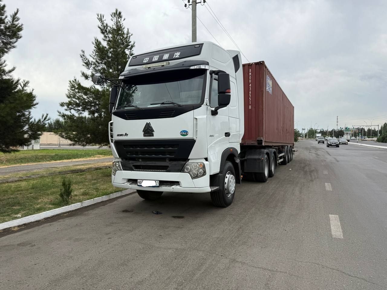 HOWO A7 + SOMMER Контейнеровоз прицеп cотилади