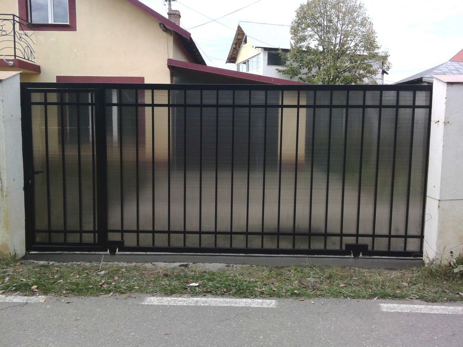 Porti din fier forjat,poarta,copertine,inox,aluminiu,lemn