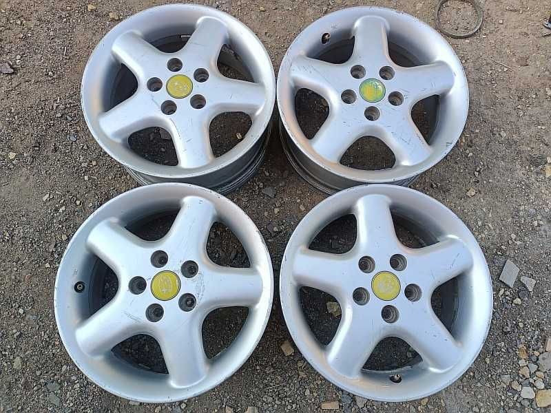 Продам оригинальные легкосплавные диски на автомашину Subaru