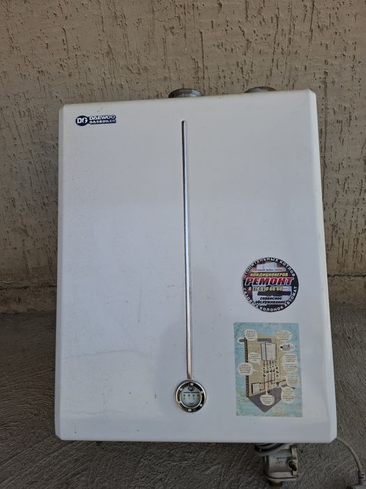 Настенный газовый котёл. Рабочий. DAEWO