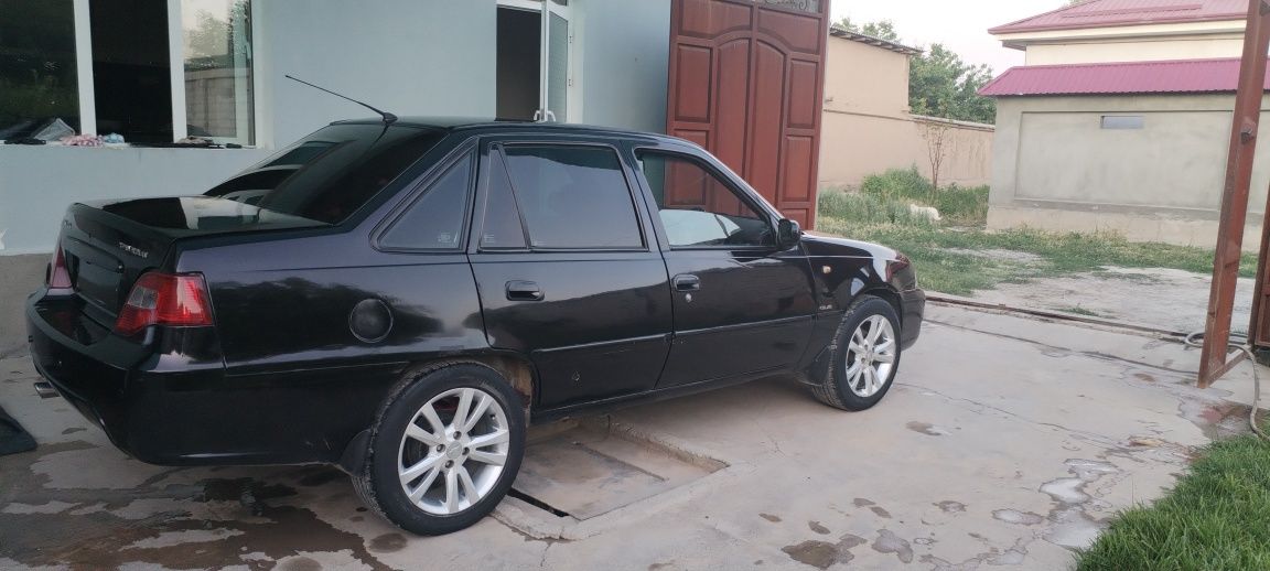 Nexia 2 2009yil qora