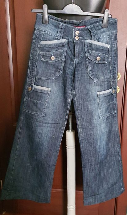 Blugi largi cu buzunare frontale