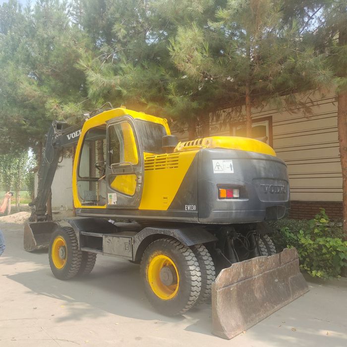 Эксковатор 2004йил 130 холати аьло