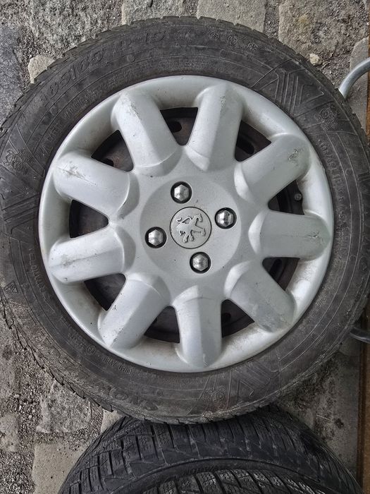 Зимни гуми с джанти и тасове 185/65/R15 за Пежо и Ситроен