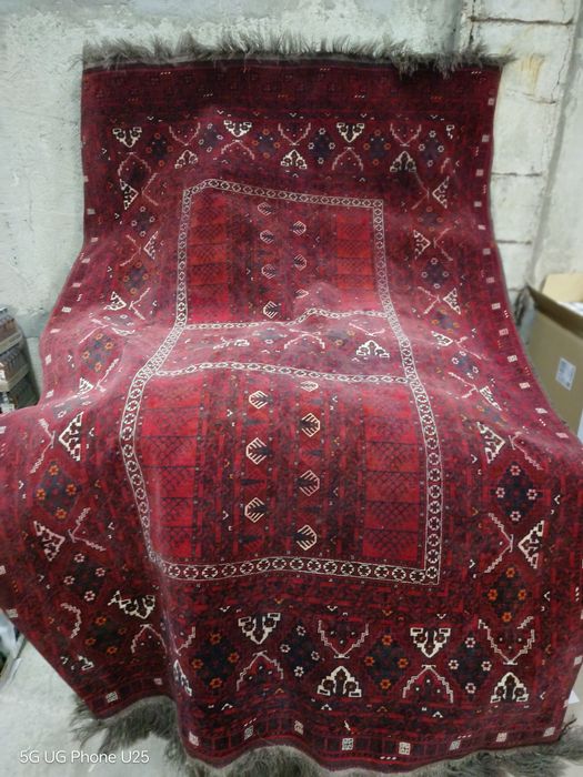 Ръчно тъкан килим