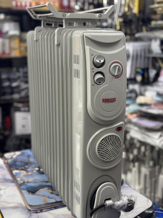 Maslinniy pechka , масляный обогреватель , abogrevatel maslenniy .