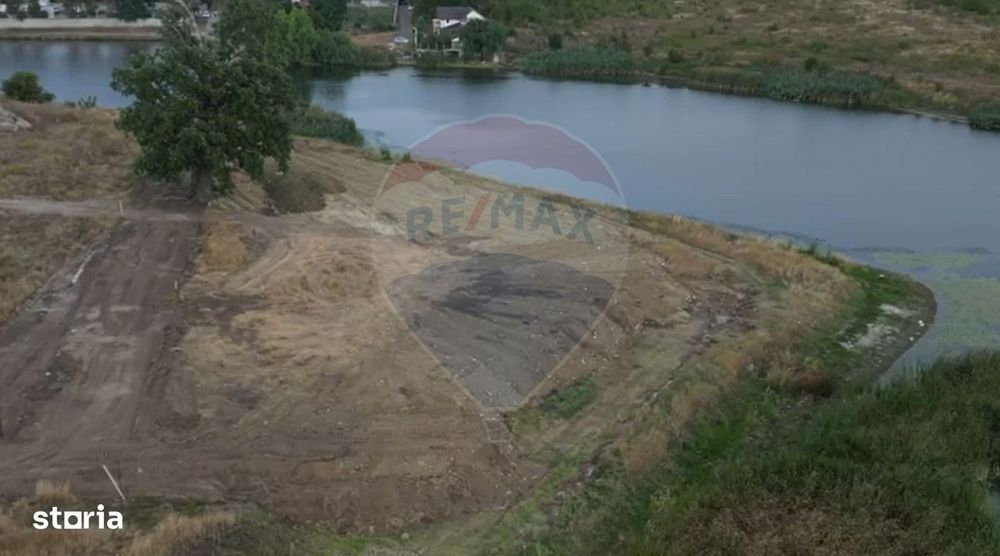 Teren Intravilan de Vânzare – 5.000 mp cu Deschidere la Lac.