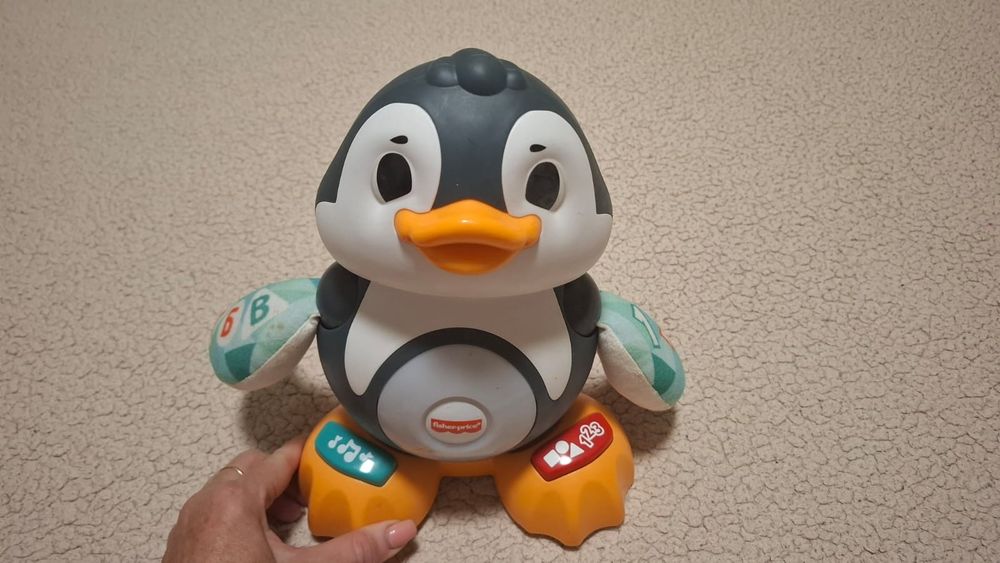 Игрушка Fisher Price Пингвин музыкальный для малышей.