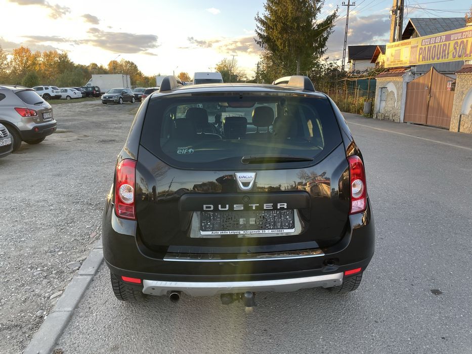 Dacia Duster benzina 1.6 110 cai tractiune 4x4 model prestige