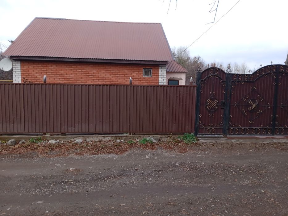 Жилой  массив Келешек Дом мансард на берегу реки Каргала