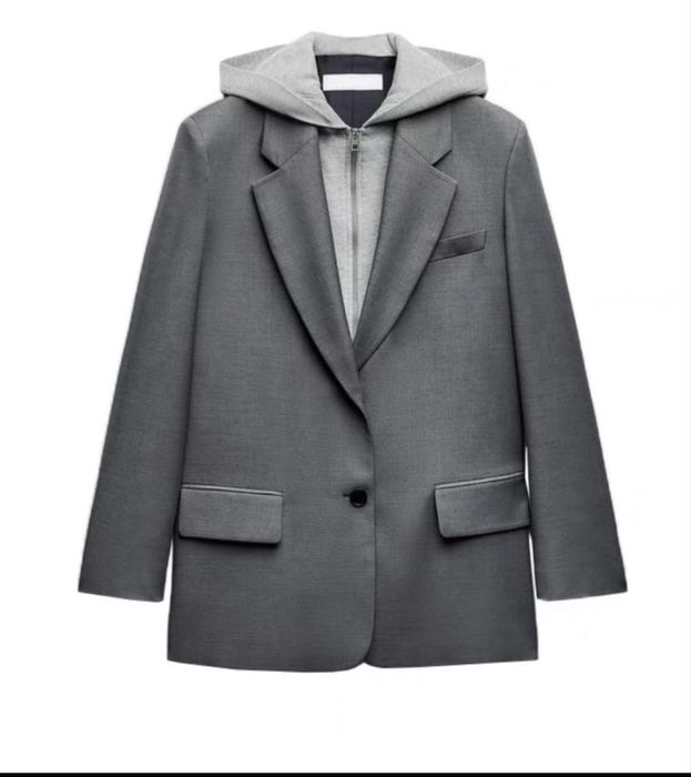 Продам новый женский пиджак с копюшоном