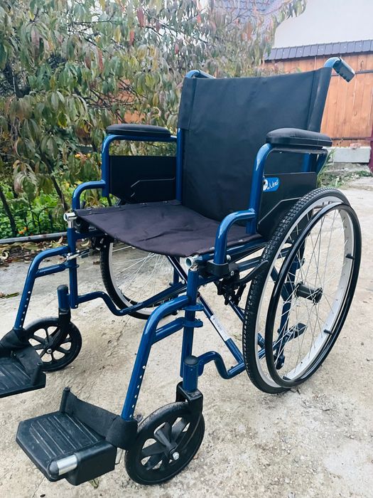 Scaun cu rotile in stare buna