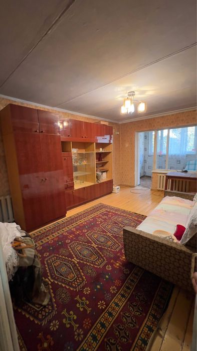 Кибрай байткурган  2 комнатная 77я серия кирпичный дом