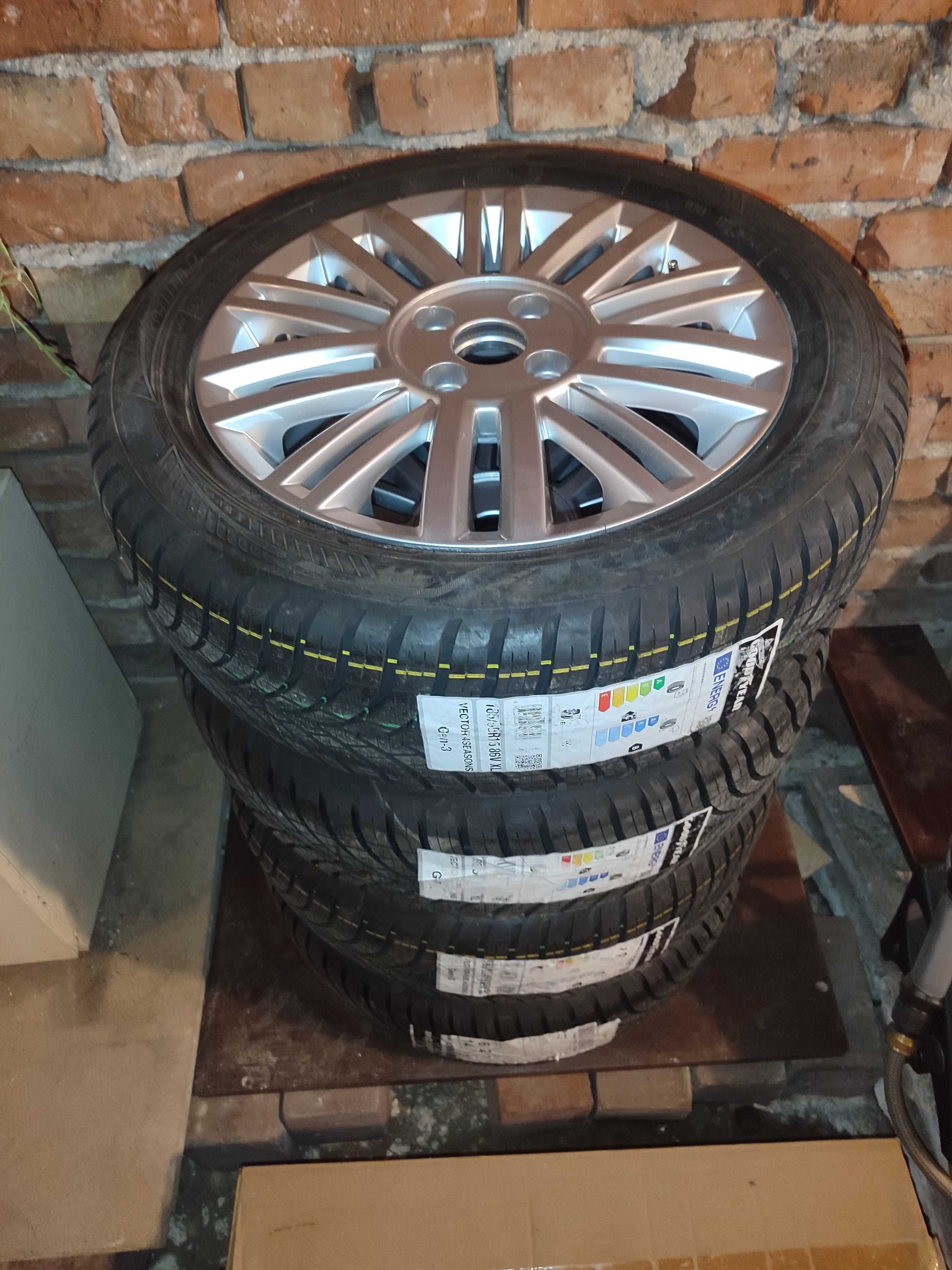 Джанти за VW Up 5,5Jx15 ET40+гуми Goodyear 185/55/15 86V+ц. капачки.