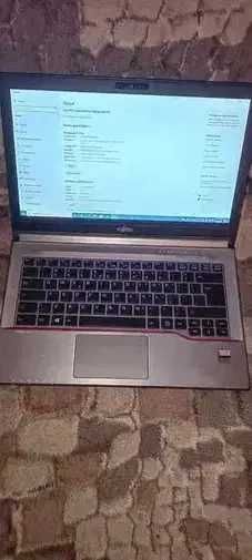 Vand laptop Fujitsu E 744