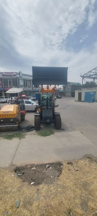 Автопогрузчик 1.5 куб объёма ковша