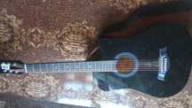 Gitara yangi kapodastir bn gilofi ham bor