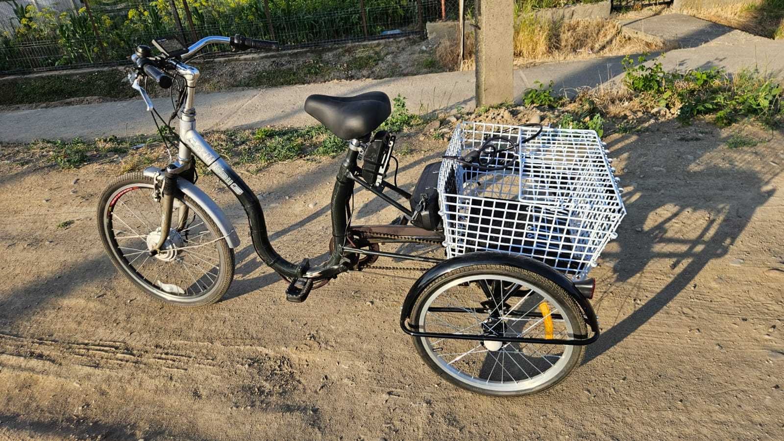 Tricicleta cu motor electric puternic , baterie noua si km putini