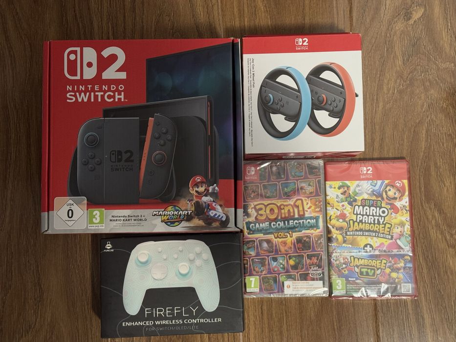 Consola Nintendo switch 2 SIGILATA + joycon volan + controller+ jocuri