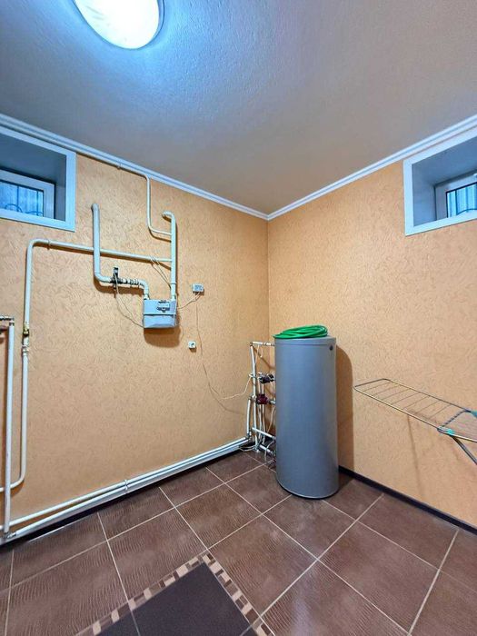 Продается  коттедж в центре города. Можно под коммерцию